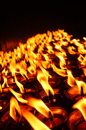Yak candles burning at night Boudhanath Stupa, Kathmandu, Nepal 22-21