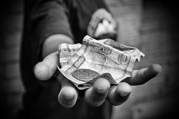 Holding Nepalese Rupees