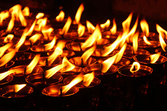 Yak candles at night at Boudhanath Stupa, Kathmandu, Nepal 3-3
