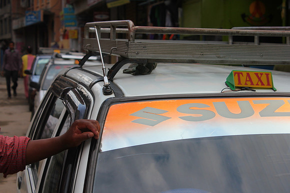 White Suzuki taxi in Nepal
