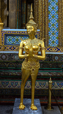Statue of a kinnara at the Emerald Buddha Temple, Bangkok, Thailand