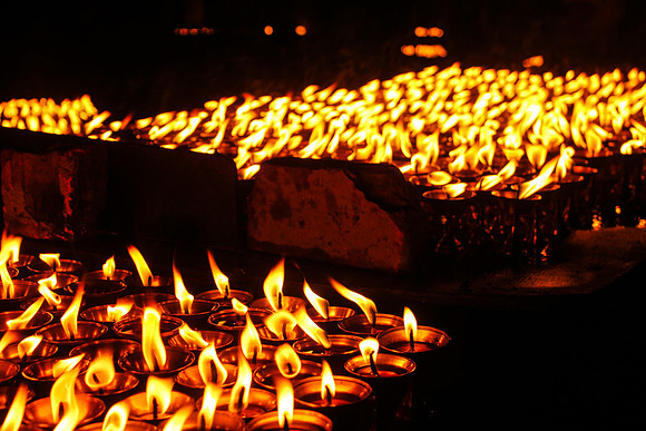 Two groups of candles at Boudhanath Stupa, Kathmandu, Nepal 2-2