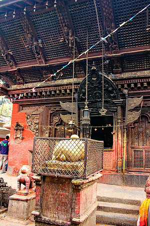 Shiva’s mount, the bull Nandi, kneeling in front of Kumbeshwar temple, Patan, Nepal