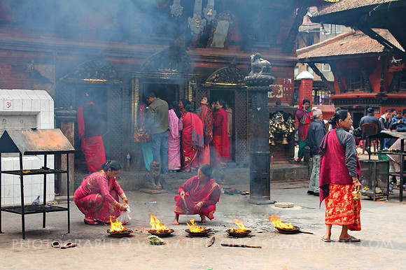 Fire sacrifice at Kumbeshwar Temple Complex Patan, Nepal