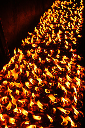 Long row of Candles at Boudhanath Stupa, Kathmandu, Nepal 20-19